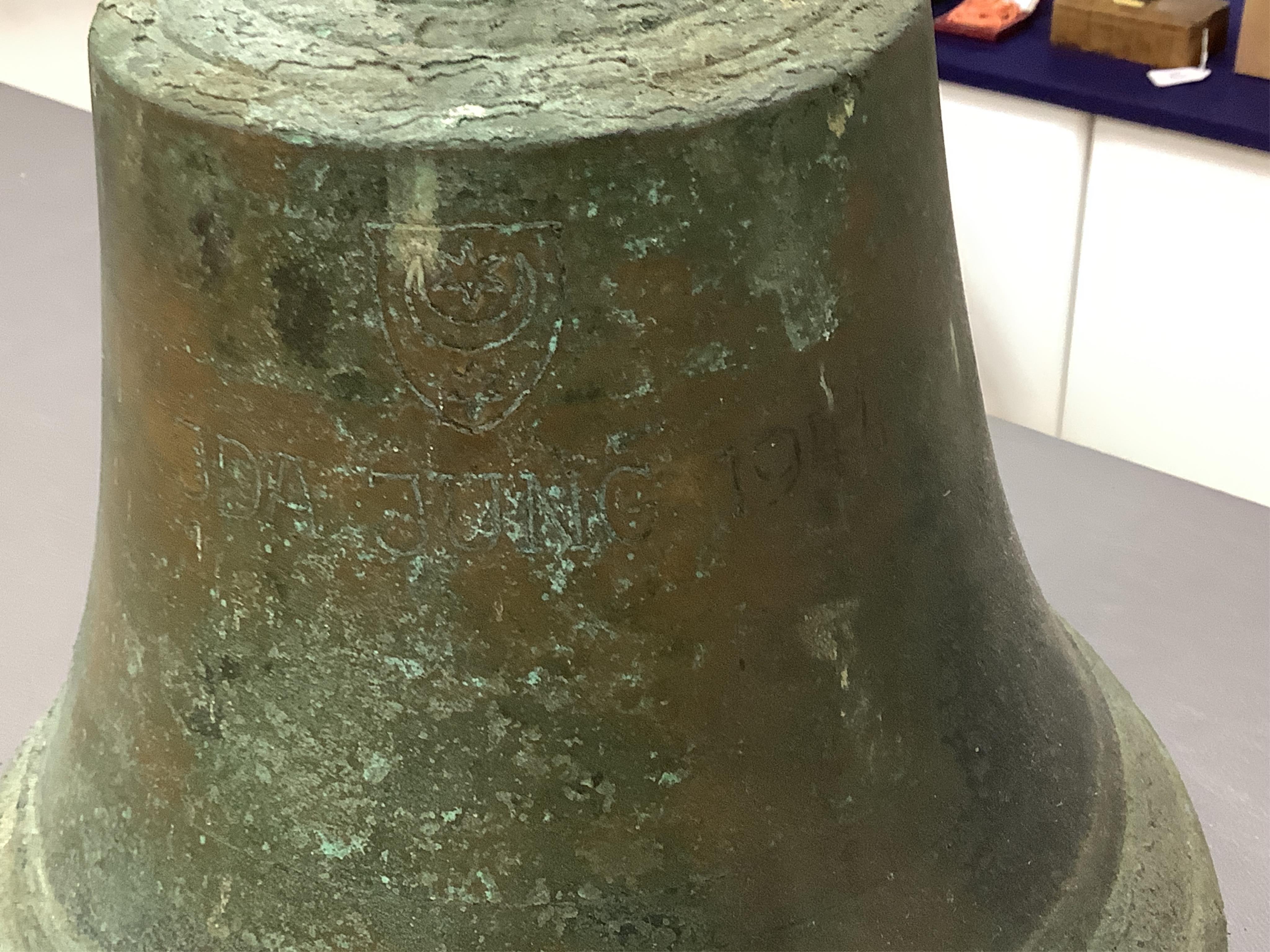 A ship’s bell, marked ‘J D A Jung 1944’, 28cm maximum height